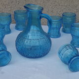 Set of jug and 10 blue glass goblets with floral motifs