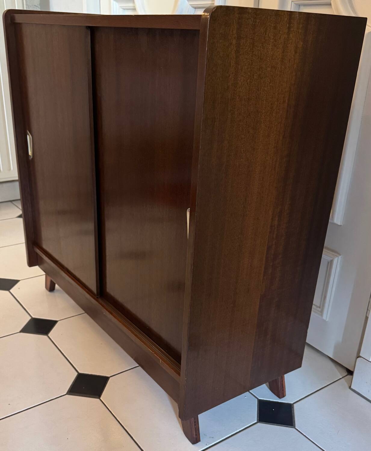 Vintage shoe cabinet with compass legs