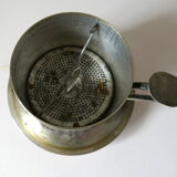 Individual silver metal coffee maker