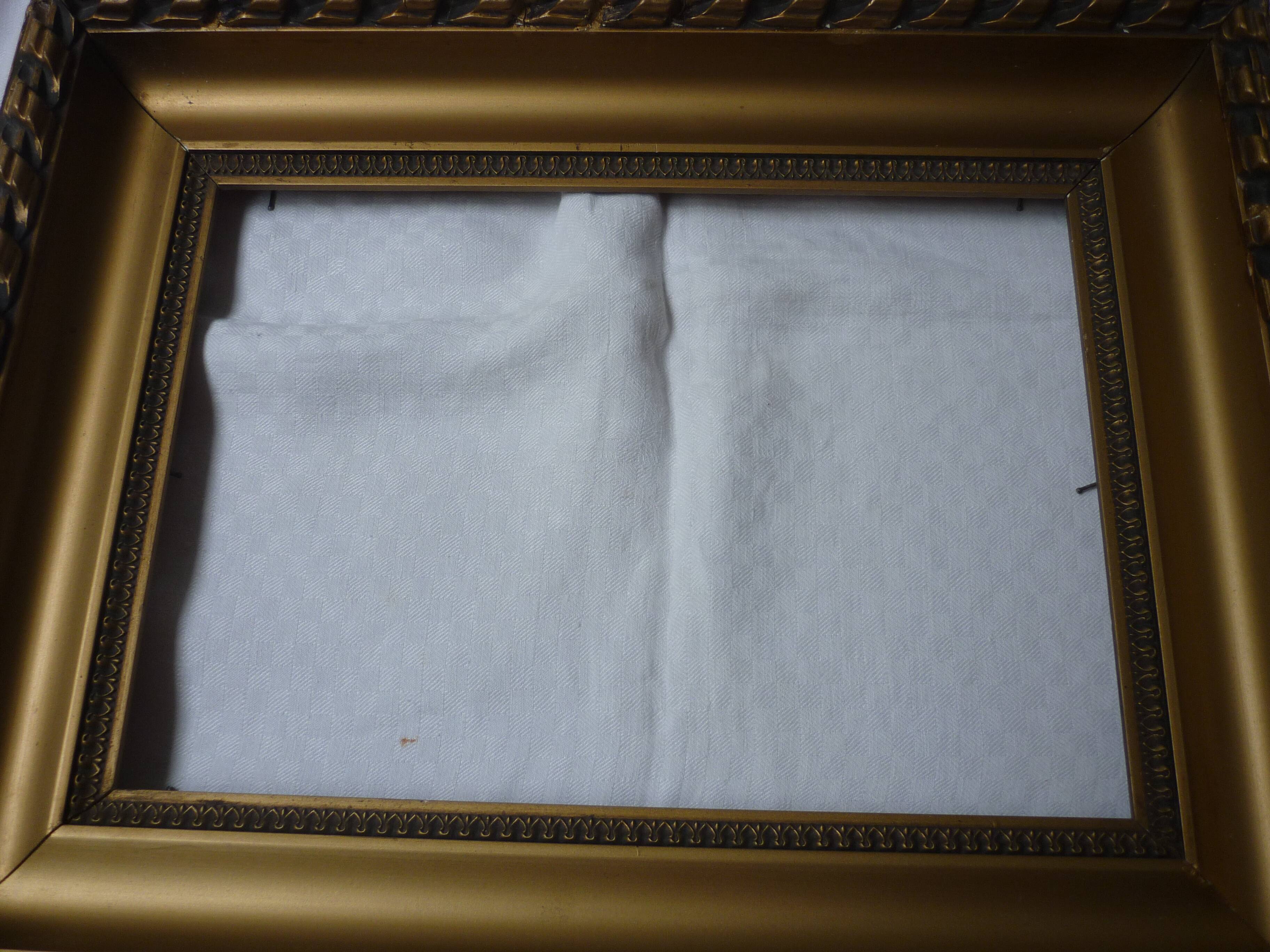 Gilded wood and stucco frame