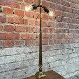 Old brass table lamp with claw feet