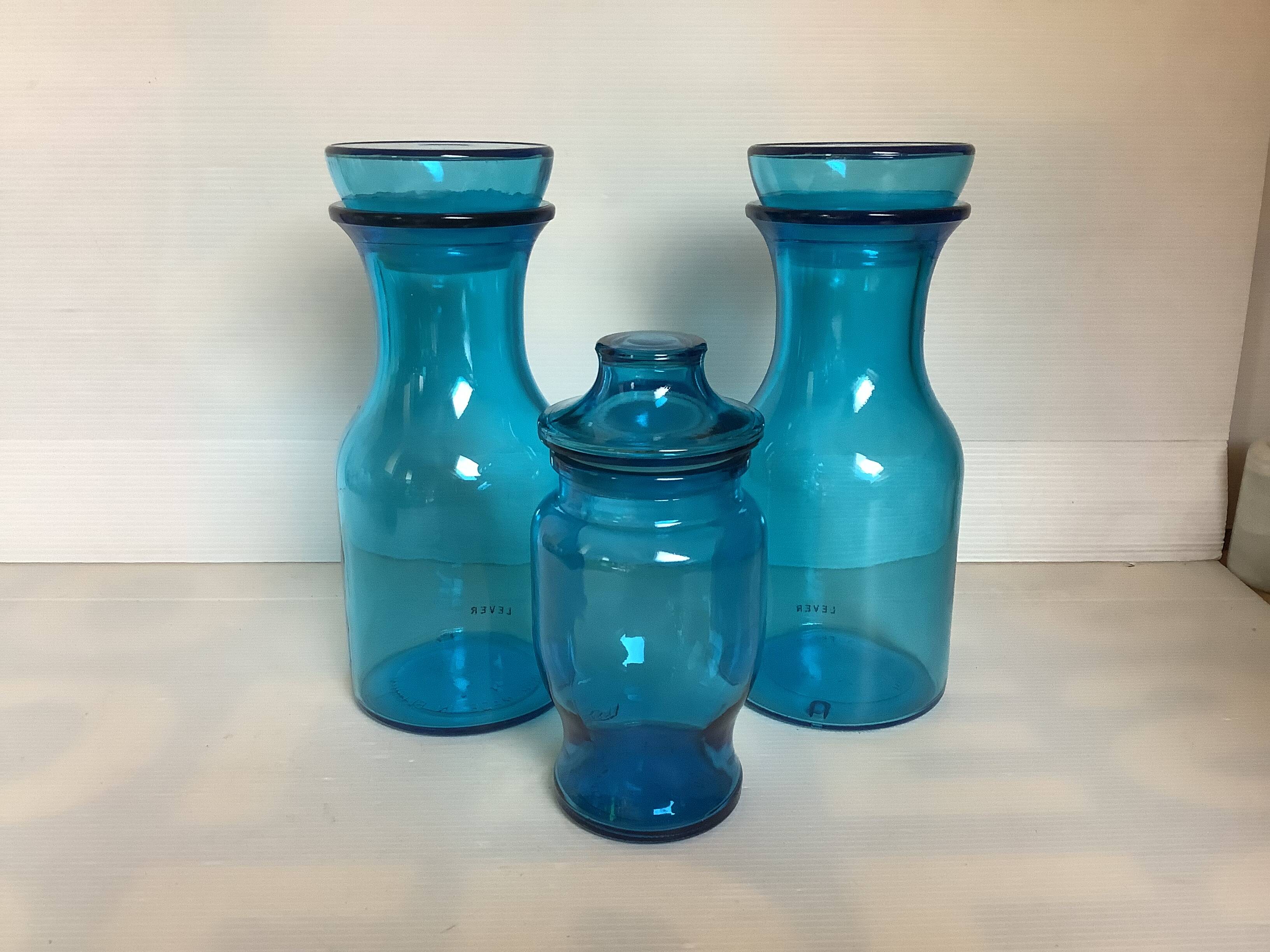 Trio of blue glass candy jars from the 70s