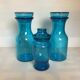 Trio of blue glass candy jars from the 70s