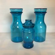 Trio of blue glass candy jars from the 70s