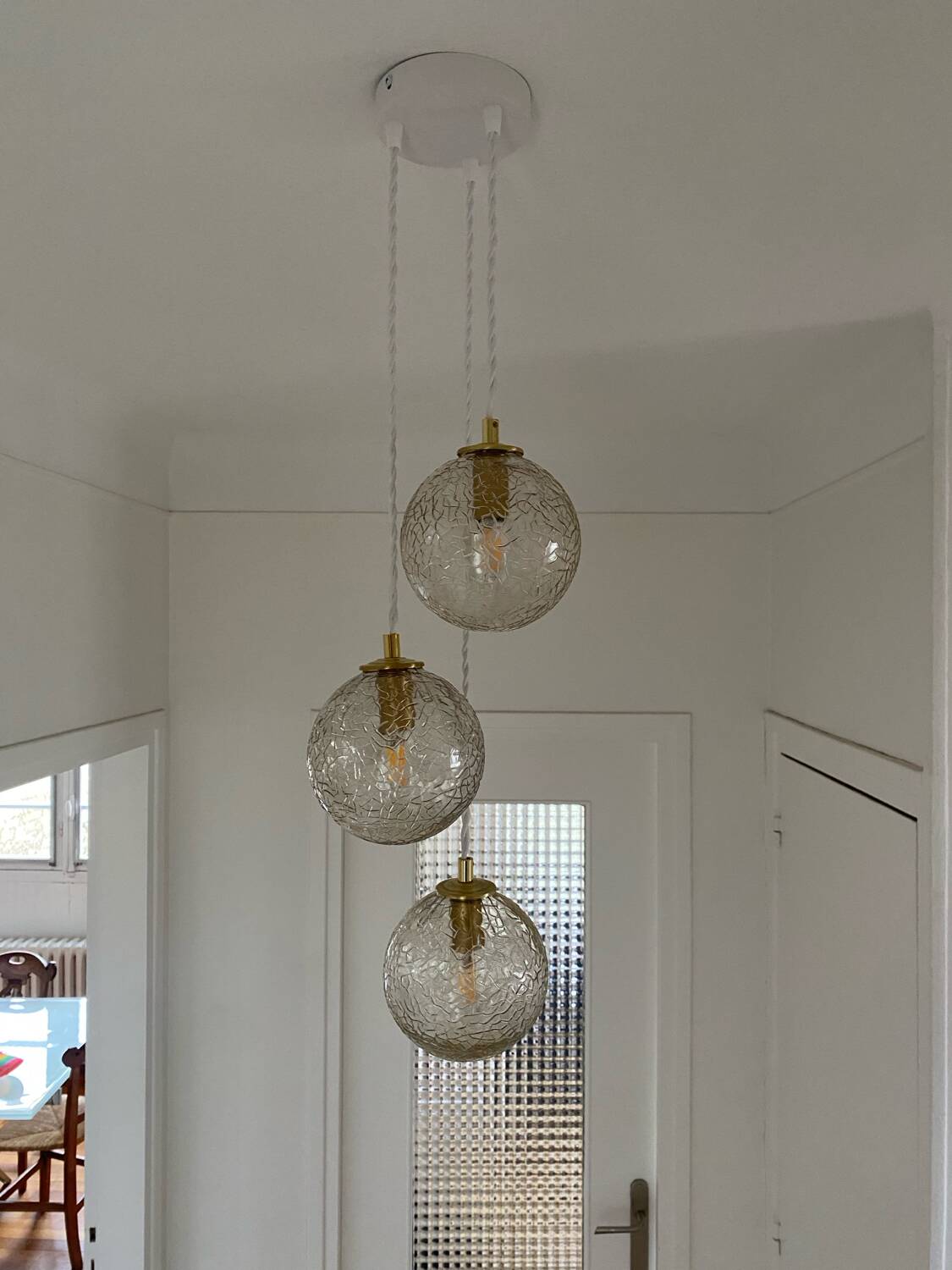 Triple pendant light with vintage glass globes