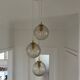 Triple pendant light with vintage glass globes