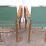 Paire de fauteuils bridge en skaï vert 1960