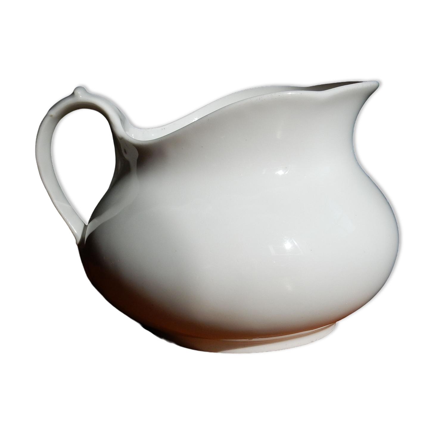 White ceramic water pitcher broc pot