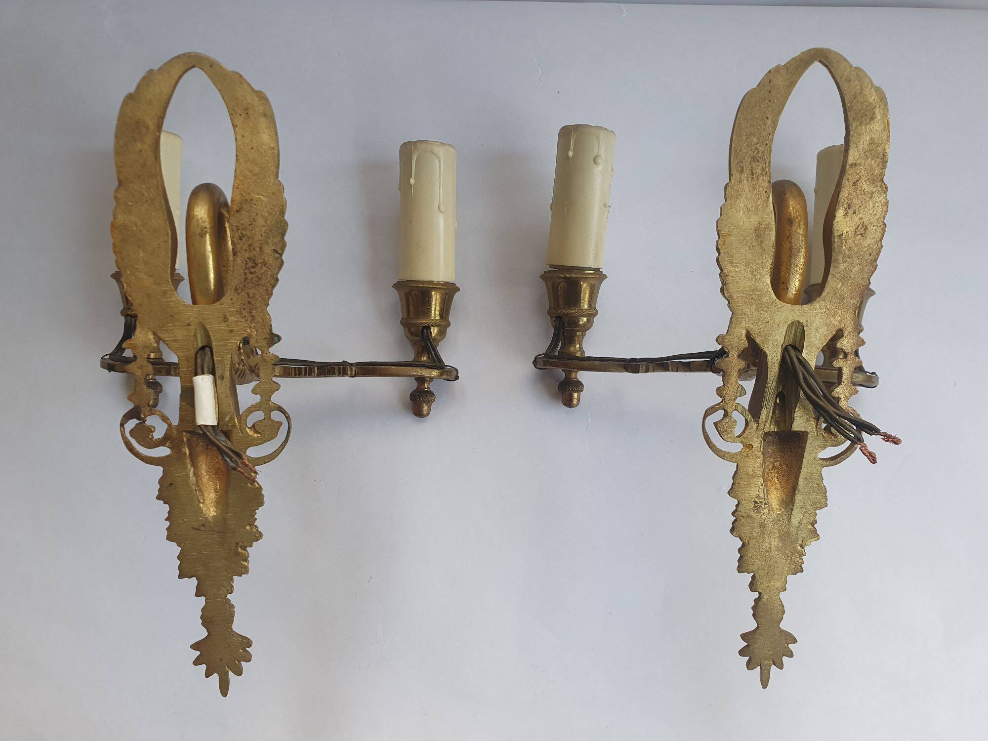 Pair of wall sconces candle holders in Empire style in bronze
