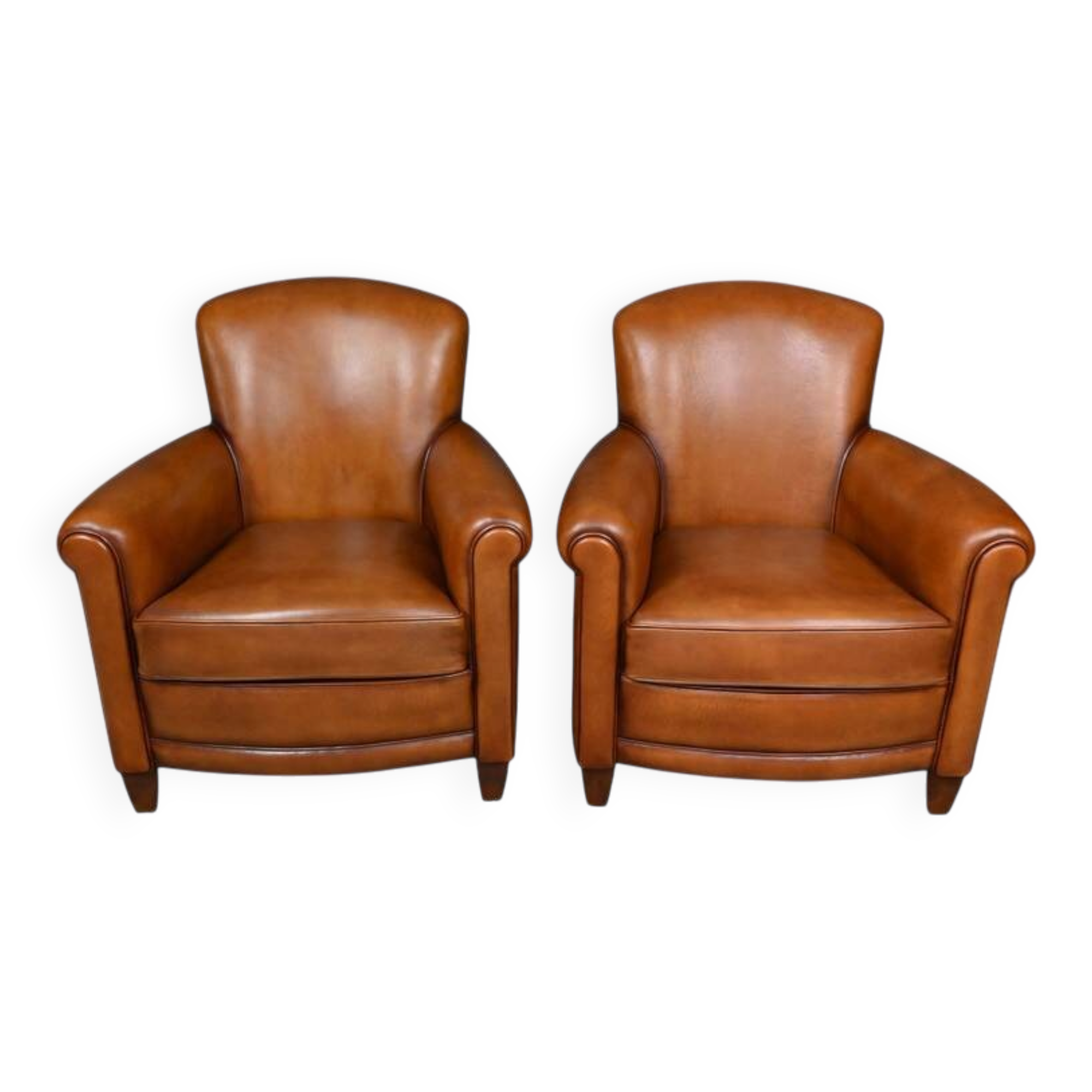 Paire de fauteuils club en cuir