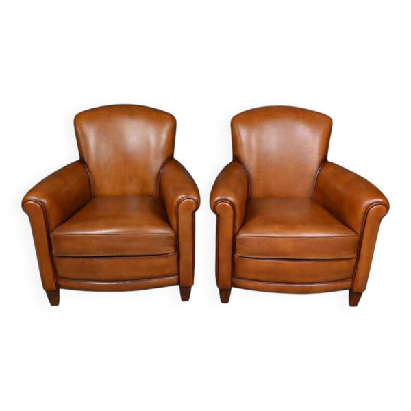 Paire de fauteuils club en cuir