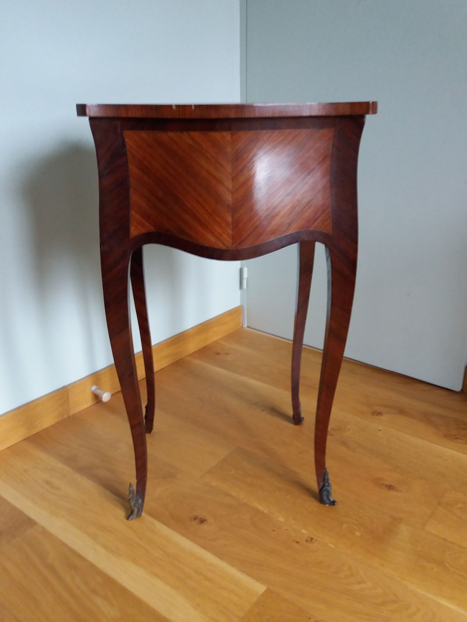 Nightstand with writing desk in Louis XV style.