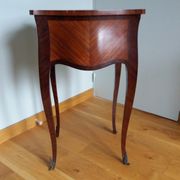 Nightstand with writing desk in Louis XV style.
