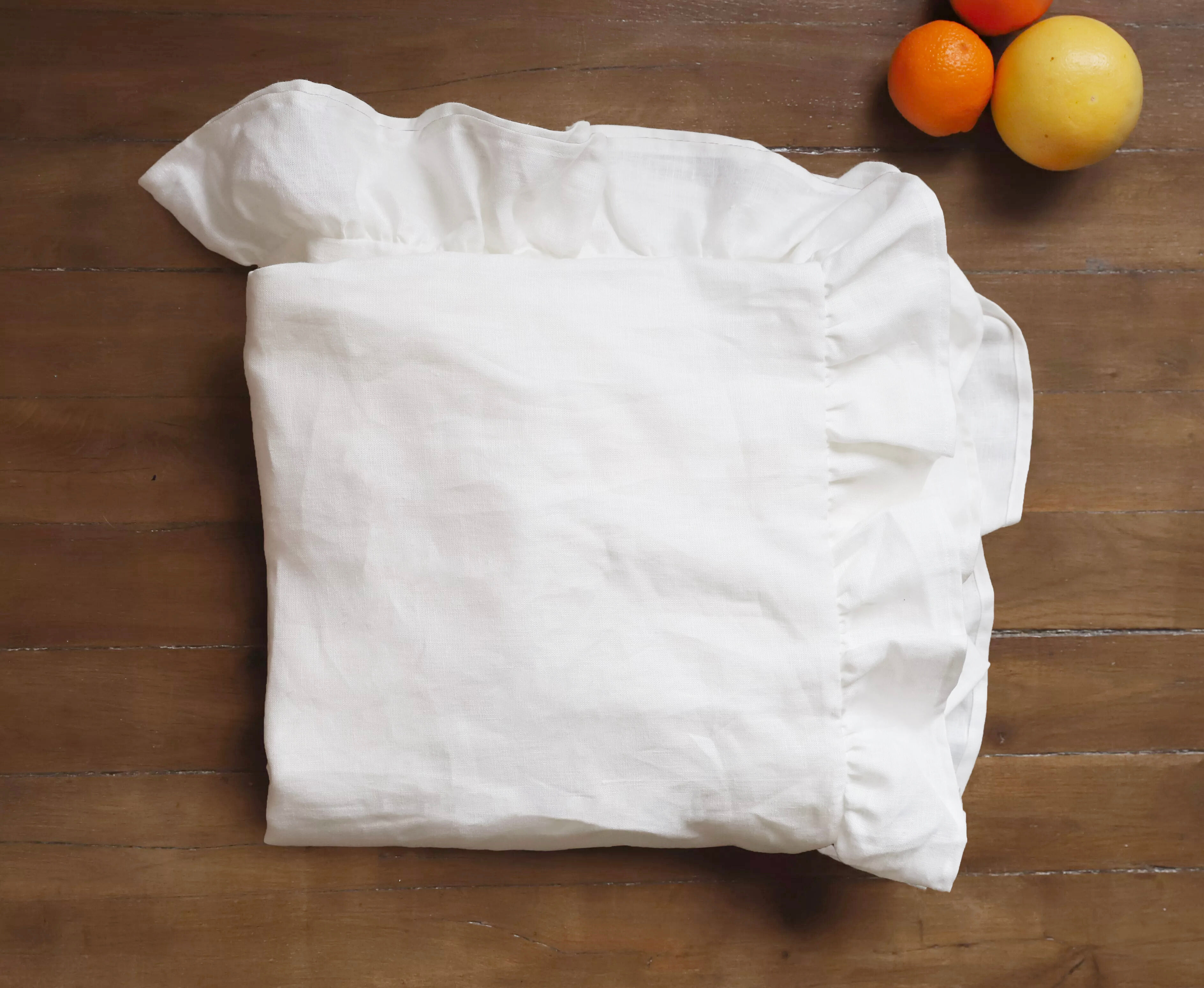 Flying tablecloth in white upcycled linen