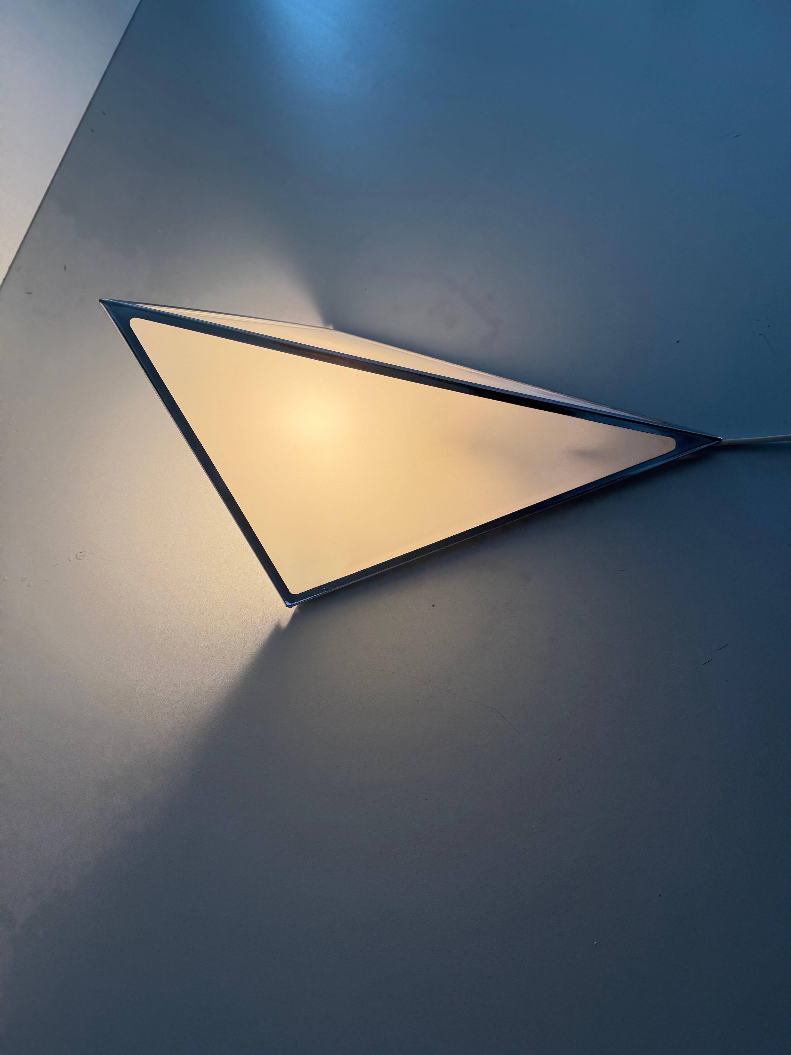 Simple opal glass wall light with an aluminium body, 1980s, Germany.