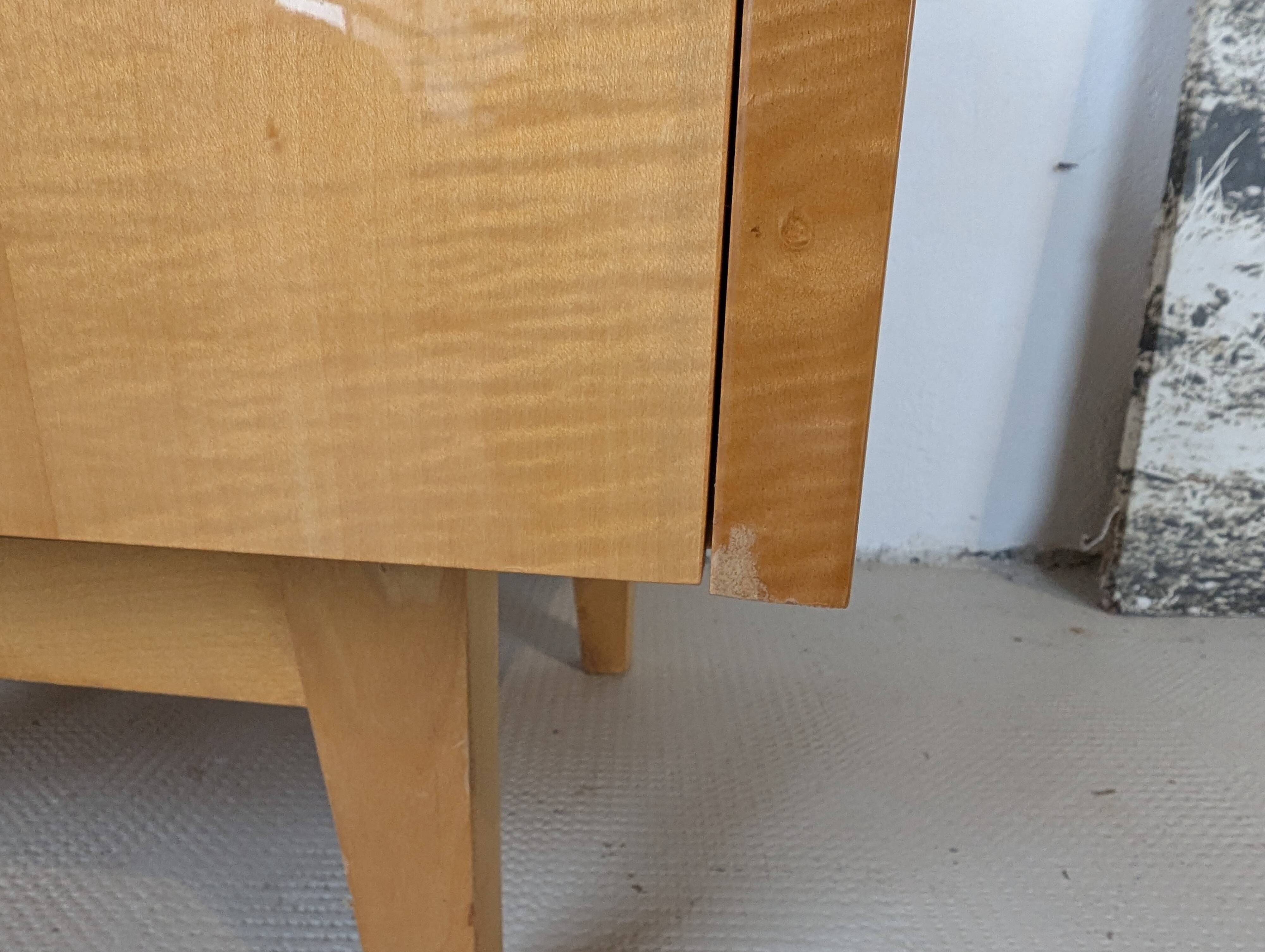 Pair of bedside tables in light wood