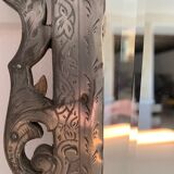 Eventful beveled mirror and openwork period 1900 repelled tin decoration