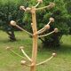 Brutalist coat rack on boxwood stand