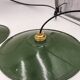 Suspensions in enamelled sheets