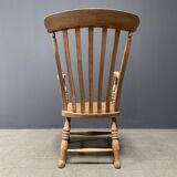Light colored elm wood English Windsor armchair