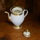 Porcelain verseuse from Paris, gold fillets, Empire period.
