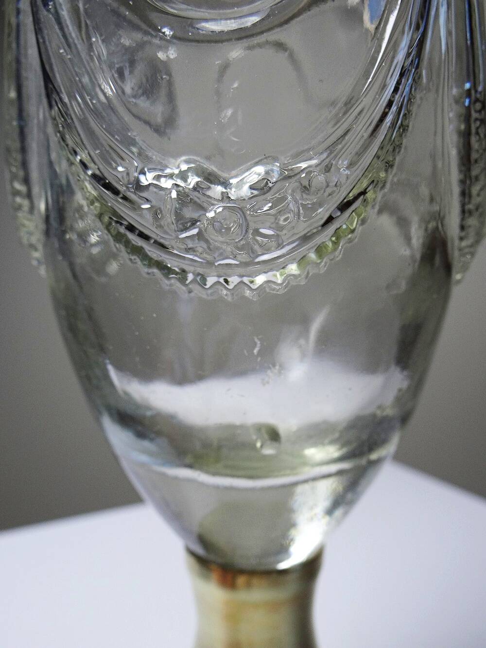 Vintage decorative jug in moulded glass and gilded brass, Italy circa 1980.