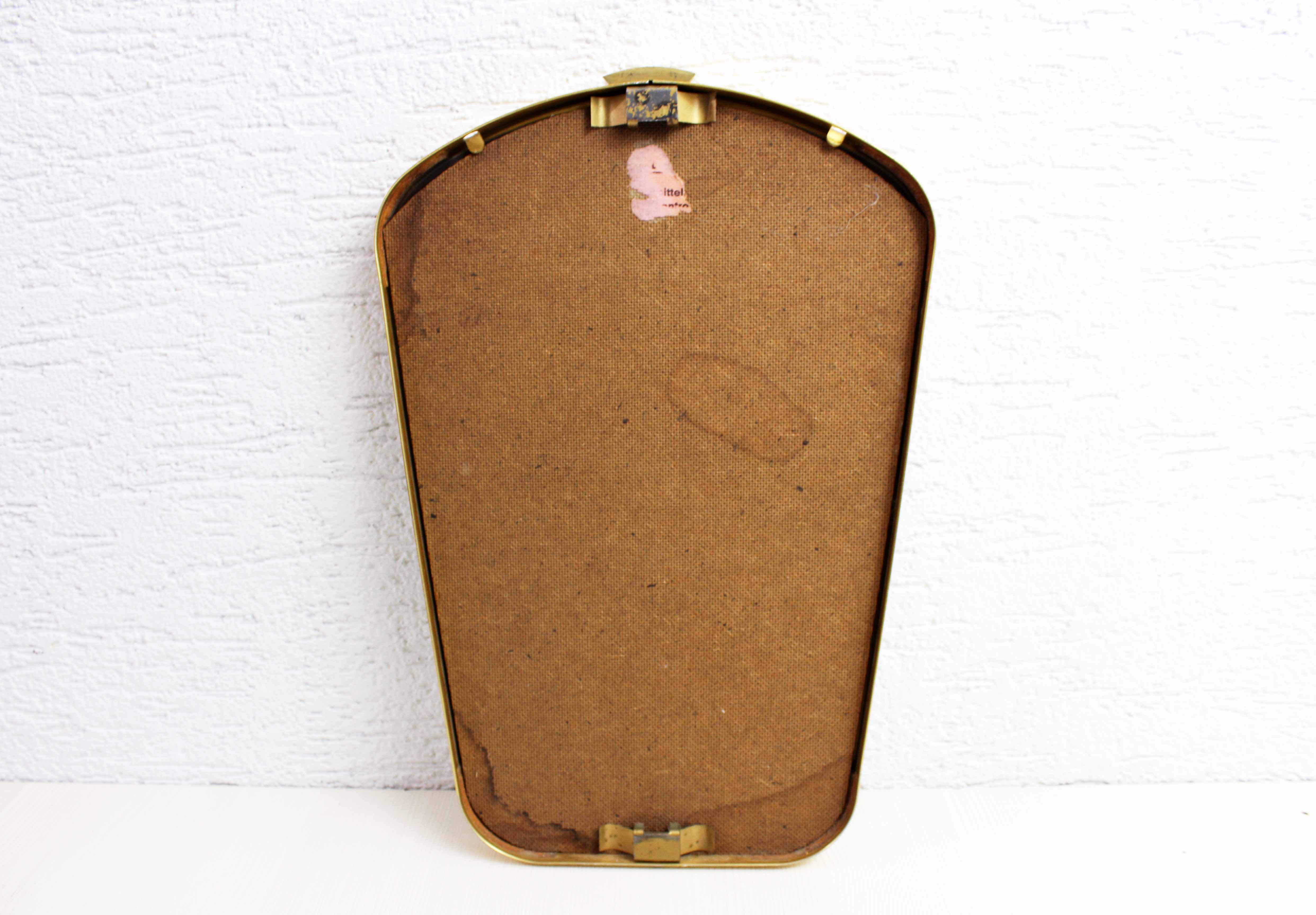 Freeform brass mirror, 42x28 cm