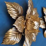 Pair of Masca flower wall lights in gold metal