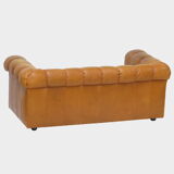 Mid century 2.5 seater sofa in thick cognac buffalo leather, 1970s.