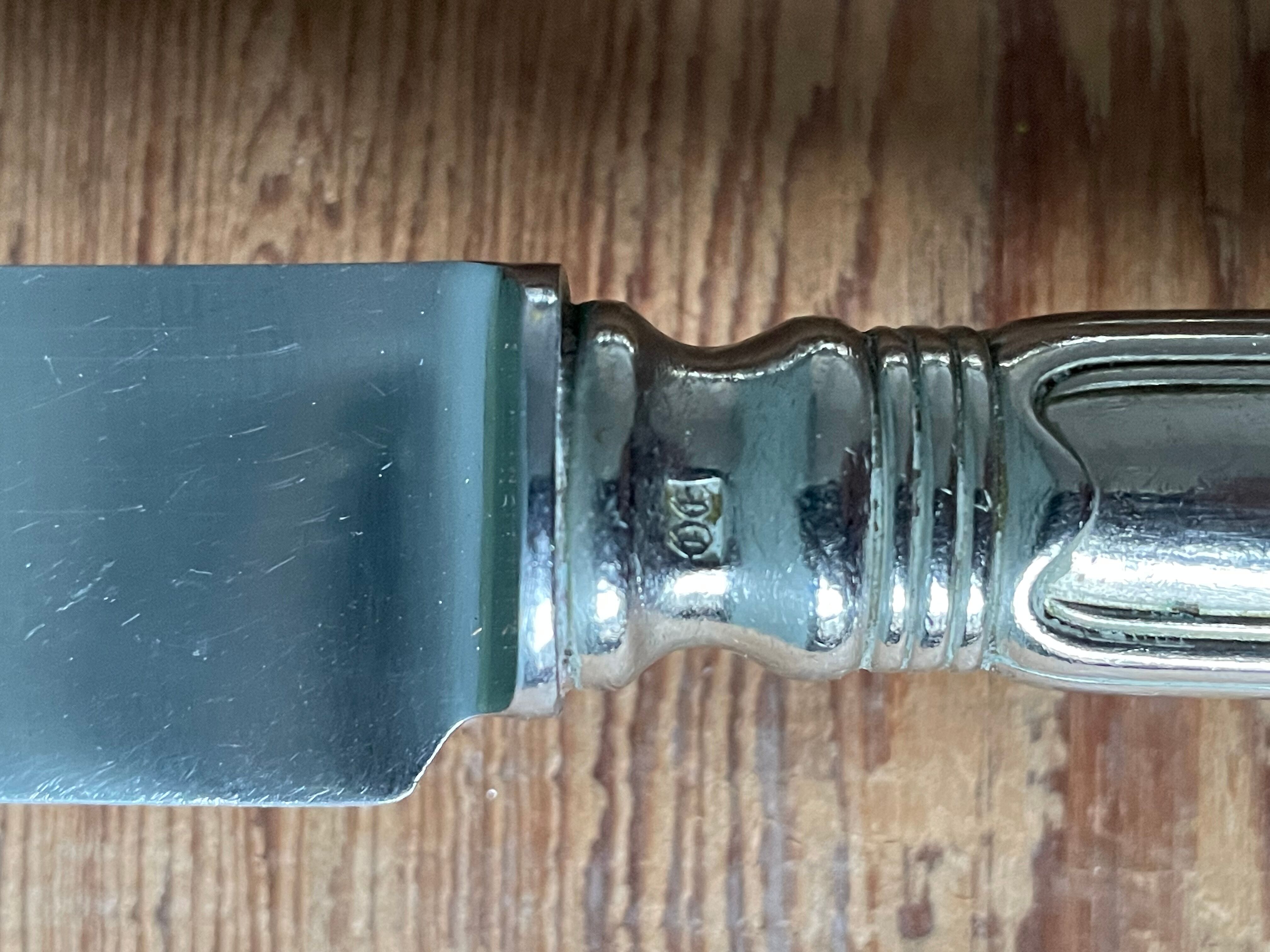 12 antique Ercuis table knives in silver metal