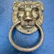 2 brass lion handles in Louis XIV style
