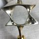 Pair of silver and gold metal candlesticks