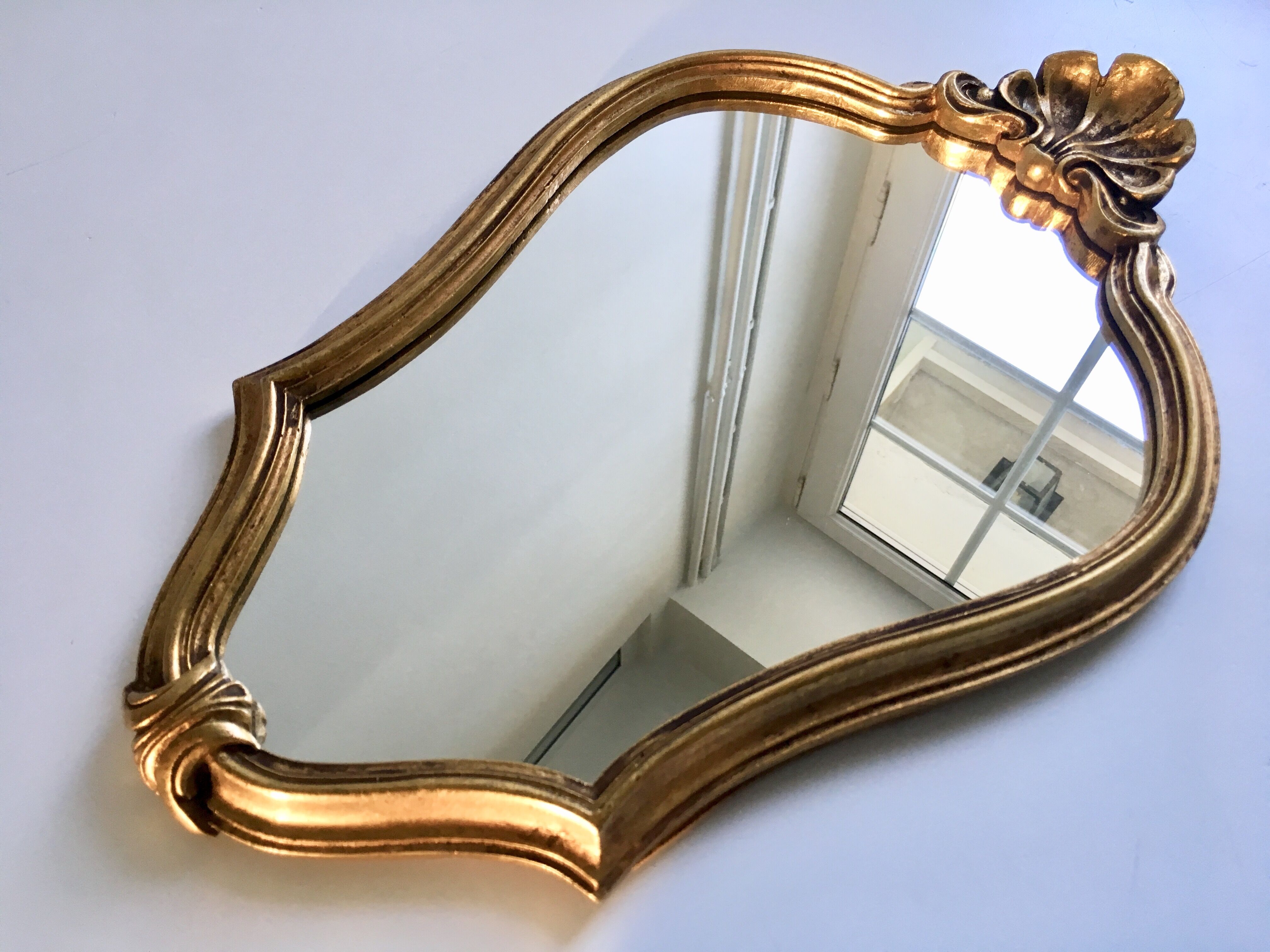 Mirror rocked carved and gilded wood 30x45cm
