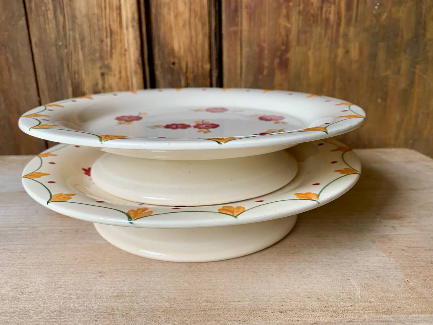 Two old Longwy Bagdad pedestal plates