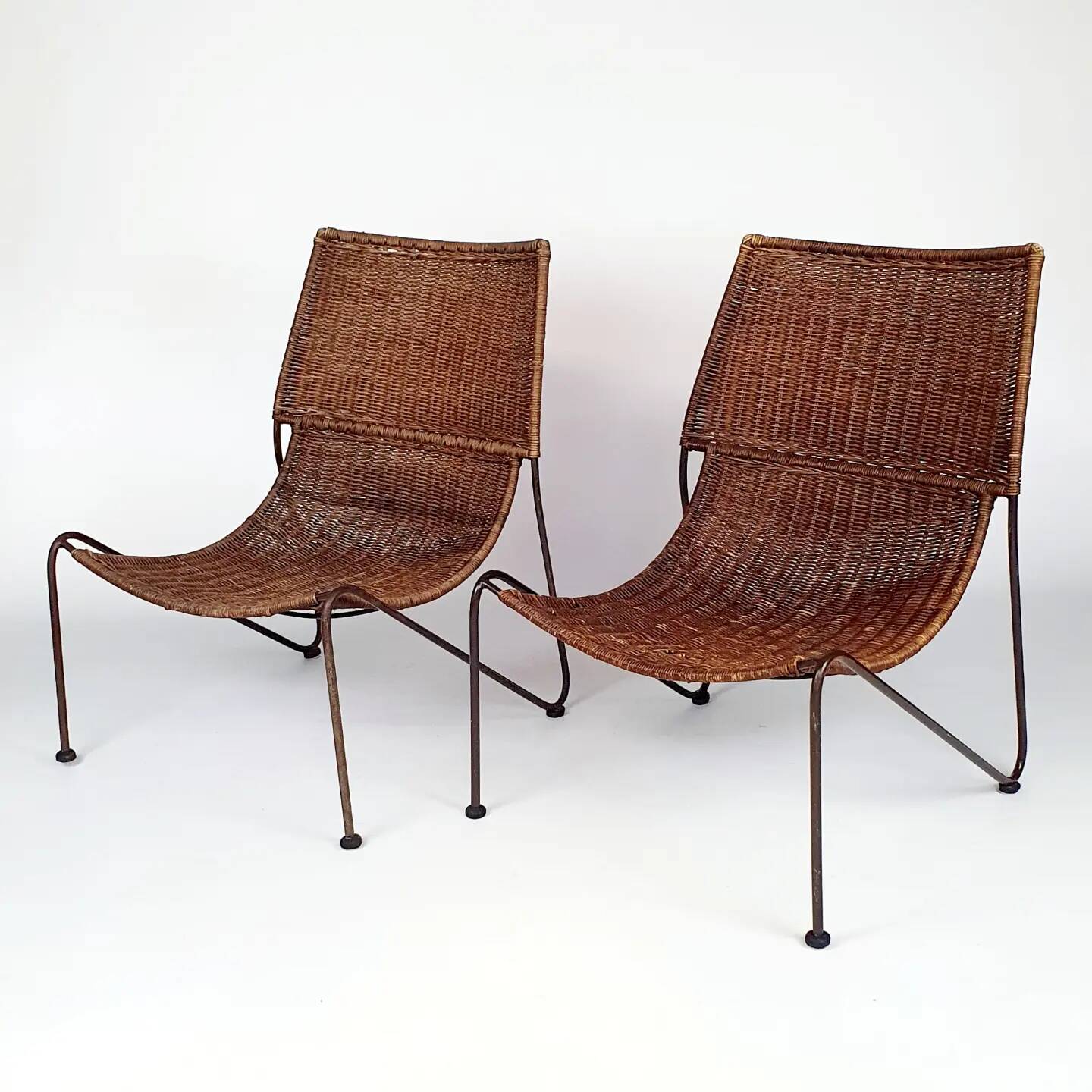 Pair of "Mombasa" rattan and steel armchairs by Pier One