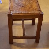 Oak stool seated in straw