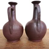 pair of terracotta bottles or carafes