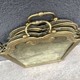 Antique brass fireplace screen from 1920, vintage spark guard.