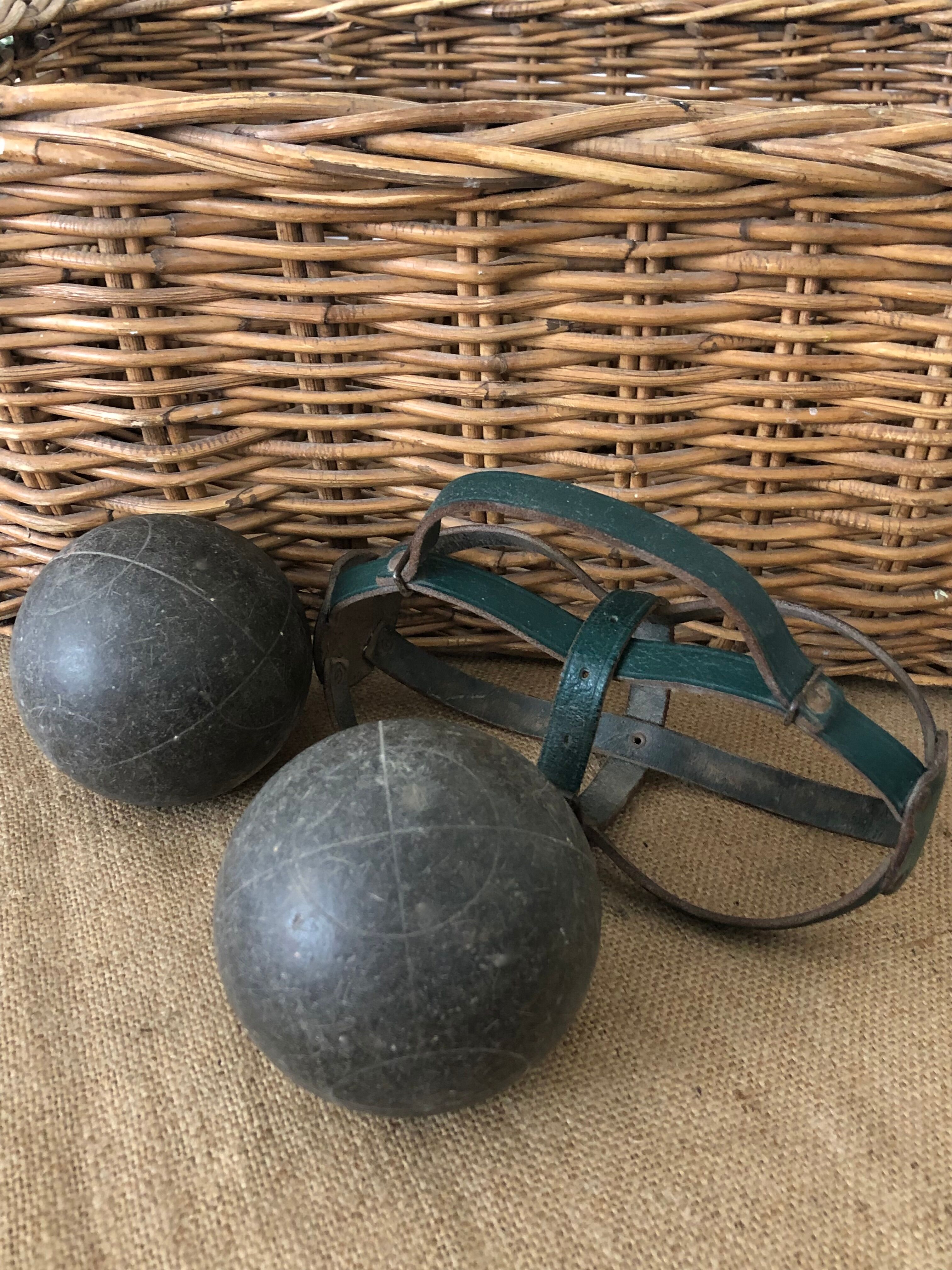 Petanque balls in their strap bag