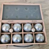 Old obut balls with original wooden box