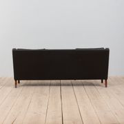 Danish black leather and rosewood sofa