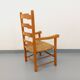 Vintage armchair in beech wood and straw from the 1950s.
