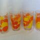 Verres vintage décorated with orange and yellow lemon fruits, Italy.