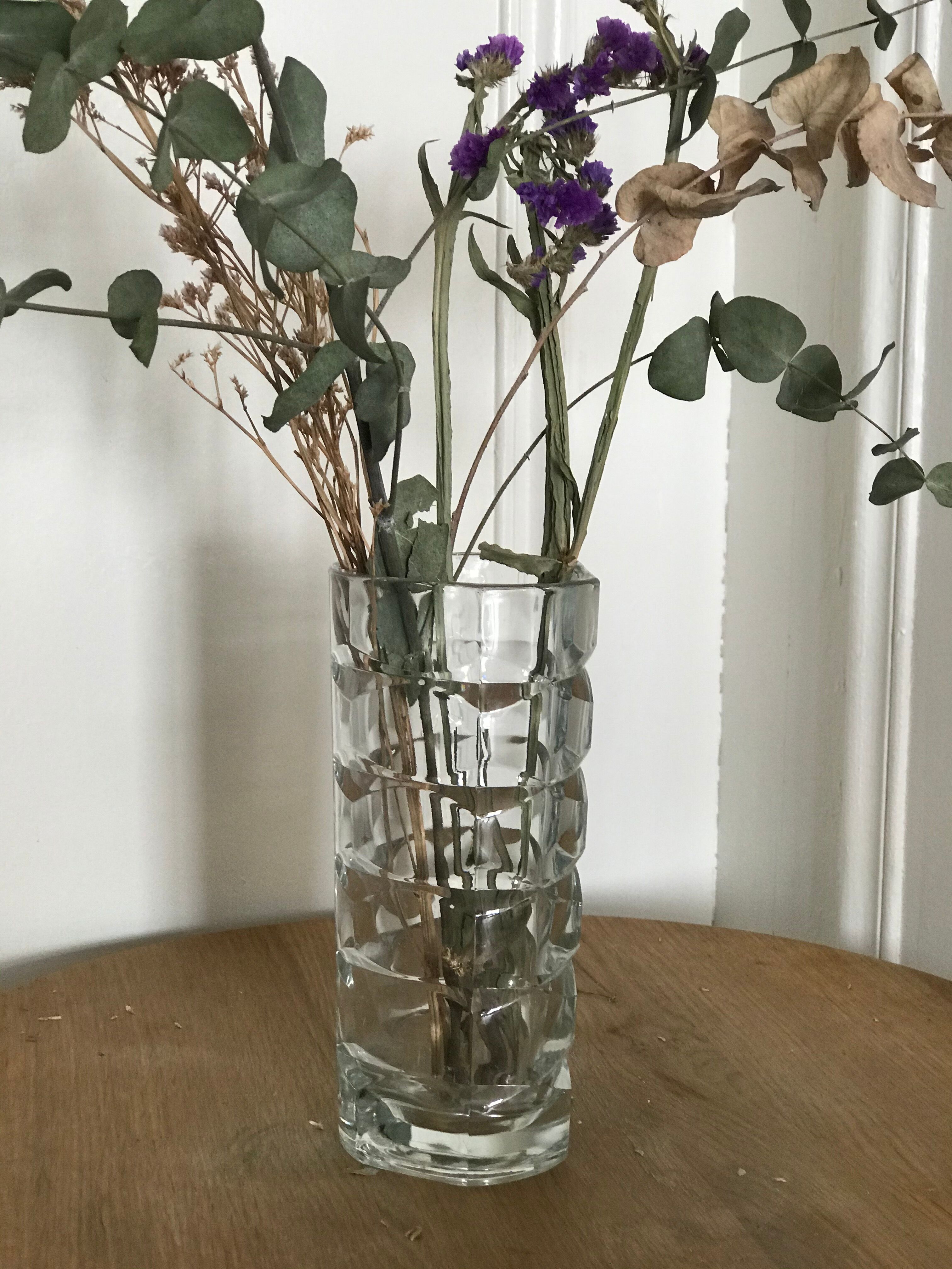 Multi-faceted moulded glass vase.