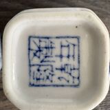 Antique Chinese tea set decorated with dragons.