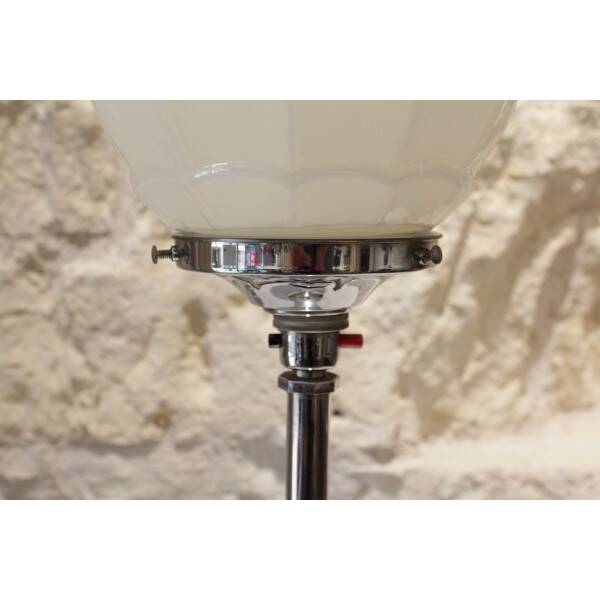 Chrome metal lamp with glass globe, Art Deco style, 20th century period.