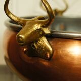 Copper cauldron with golden bronze bull heads