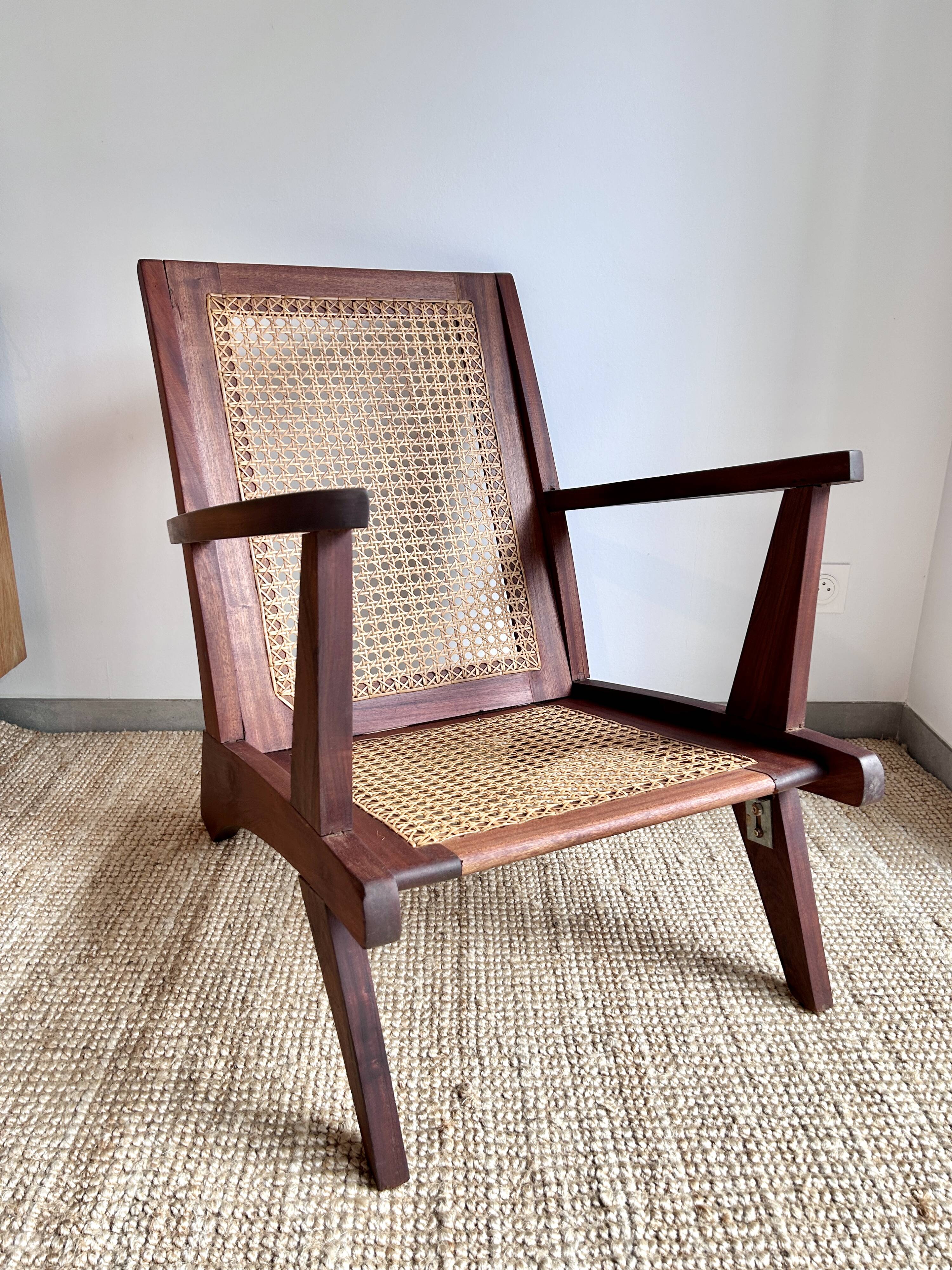 Reconstruction armchair in teak and caning