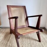 Reconstruction armchair in teak and caning