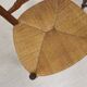 3 wooden and straw chairs, decorated with a sheaf of wheat.